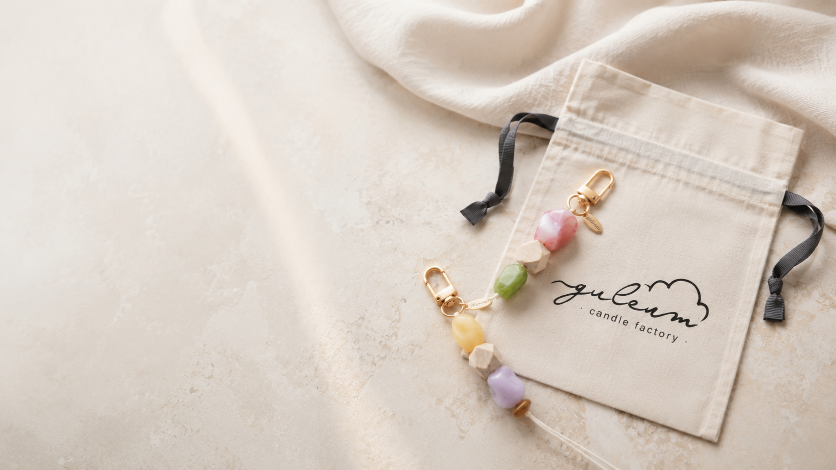 Guleum pouch and charm on soft fabric